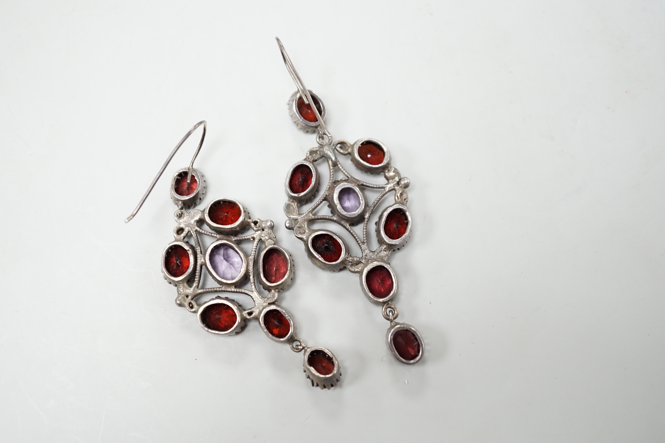 A pair of late 19th/early 20th century white metal and two colour paste cluster set drop earrings, 72mm.